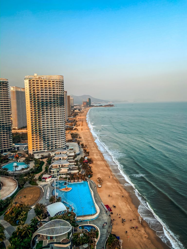 high rise buildings near sea during daytime